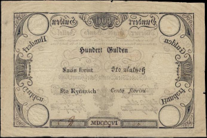 Alte deutsche 100-Pfennig-Banknote mit Porträt eines Mannes auf schwarzem Hintergrund.