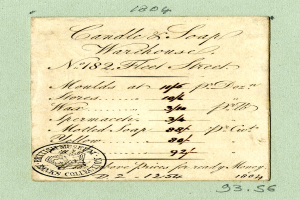 Ein Beleg mit einem "Kerzen & Seifen-Warenhaus"-Stempel und handgeschriebener Text.